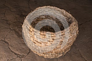 Primitive woven cattail basket