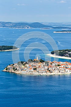 Primosten town on a peninsula vacation in the Mediterranean Sea portrait format in PrimoÅ¡ten, Croatia