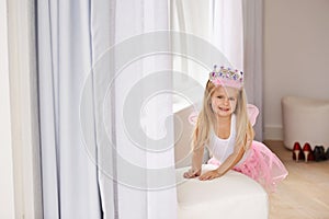 Princess, costume and portrait of girl in home for fun, playing and pretend for happy kids game. Fantasy, fashion and