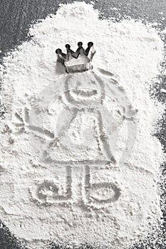 Princess in flour with baking dish crown