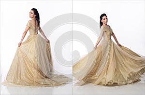 Princess wear Gold glitter Evening Gown ball dress and spin fluttering throw skirt gown around in air. 20s Asian woman dream to be