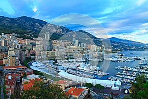 Principality of Monaco. Beautiful panoramic view of Monaco, golden hour scenery. View of residential buildings and a large port