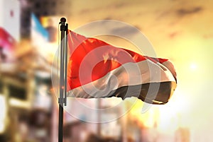 Principality of Sealand Flag Against City Blurred Background At
