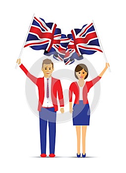 Man and woman waving the uk flag