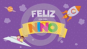 Feliz Dia del Nino greeting card - Happy Children`s Day in Spanish language. Colored letters on a yellow ribbon with a children photo