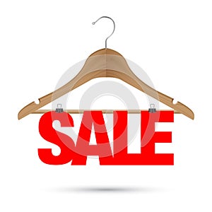 Sale sign on a wooden hanger