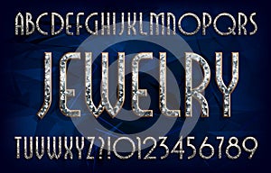 Jewelry alphabet font. Art deco golden letters and numbers with diamond gemstone. photo