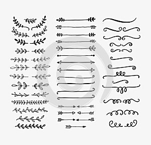 Hand drawn vector dividers. Lines, borders and laurels set. Doodle design elements.