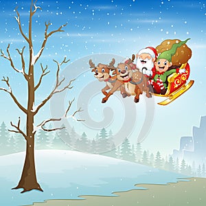 Santa Claus and elf riding deer sleigh flying over snowy forest