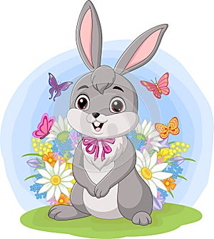 Cute baby rabbit standing in the grass