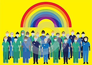 NHS hospital staff wearing face masks, standing below a rainbow photo