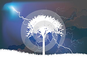 Tree silhouetted by thunderstorm