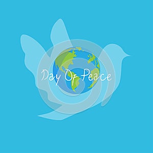A dove and a globe vector in commemoration of peace day photo