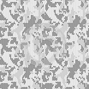 Knitted white monochrome camouflage seamless pattern. Woolen light knitted texture. Winter clothing, printing on fabric. Vector