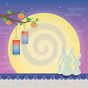 Chuseok Korean Thanksgiving Day - rabbit family on rooftop with full moon photo