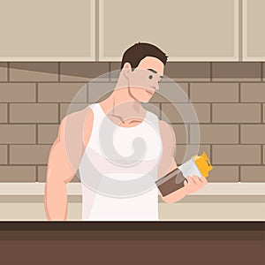 Muscular man holding protein shake after workout photo