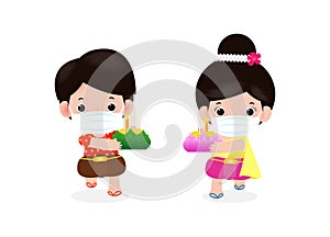 Loy Krathong Festival for new normal coronavirus or covid 19 and cute Thai children in tradition costume dress wear face mask and