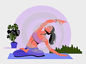 Young woman sits in a Yoga Pose and meditates