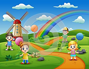 Cartoon kids in a candy land background
