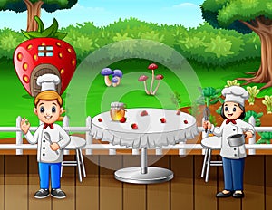 Two chefs preparing food in restaurant