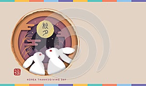 Chuseok Korean thanksgiving day - Rabbits with full moon on die cut layered background. photo