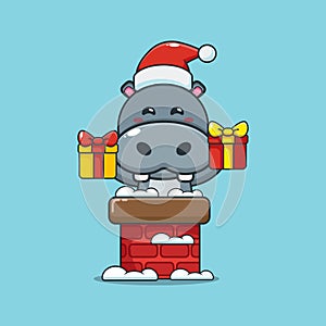 Cute hippo with santa hat in the chimney