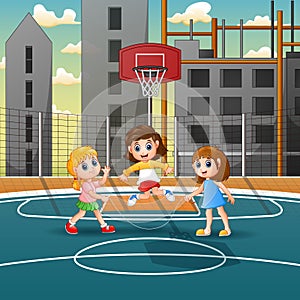 Three girls playing jump rope in the field