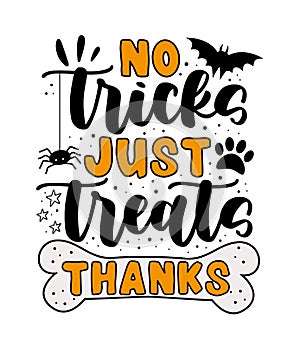 No tricks just treats, thanks - funny slogan with bone, spider, and bats. photo