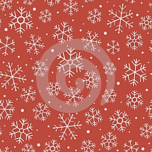 Christmas seamless pattern with snowflakes. Winter pattern on red background.