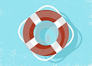 A life saver ring floating on the water