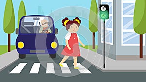A girl crosses the road at a pedestrian crossing on a green traffic light