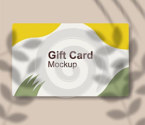 Realistic gift card mockup template design with shadow overlay.