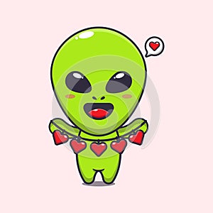 Cute alien holding love decoration cartoon vector Illustration.