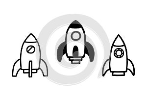 Three simple rocket ship icons black and white