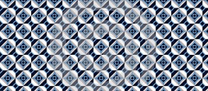 Geometric pattern featuring a repeating design of intersecting hexagons and squares.