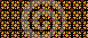 Geometric pattern featuring interlocking shapes in yellow and red on a black background.
