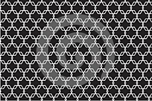 Interlocking hexagonal pattern featuring white lines on a black background