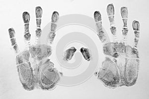 Print of hands and fingers on white background