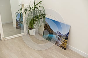 Print photography on canvas. Stretched photo canvas with gallery wrapping method, closeup, side view
