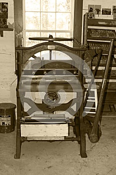 Print shop paper cutter sepia