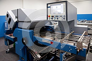 Print shop (press printing) - Finishing line