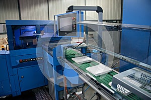 Print shop (press printing) - Finishing line