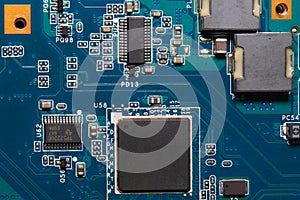 Close-up of a circuit board with electronic components photo