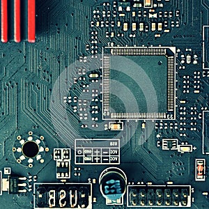 Printed Circuit Board with electrical components. Background concept for electrical engineering and modern technology