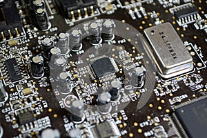 Printed Circuit Board with many electrical components. Microchip on board