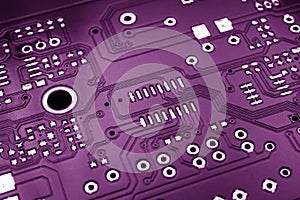 a printed circuit board in red