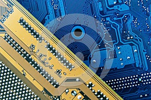 Printed circuit boards of computer motherboard close-up. Electronic and computer technology. Technology of scientific knowledge,