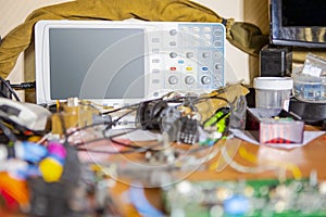 Printed Circuit Boards, Connector Termials, Testing Devices and Oscillograph in Manufacturing Laboratories. Lens Flare Added