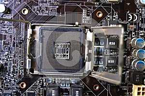 Printed computer motherboard with microcircuit, close up photo
