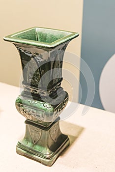 Printed green glaze vase